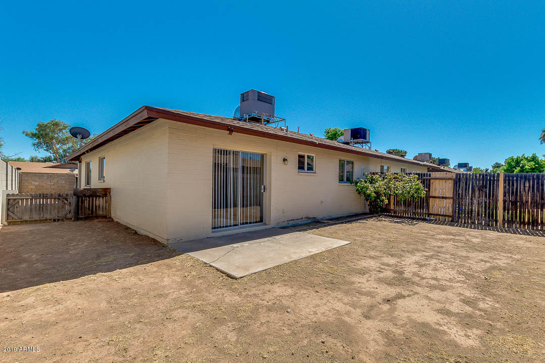 1860 East Inverness Avenue Mesa, AZ 85204 - Photo 28 of 29 a view of a house with a backyard