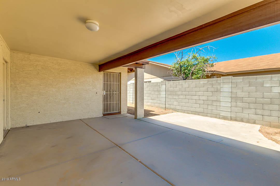 1860 East Inverness Avenue Mesa, AZ 85204 - Photo 4 of 29 a view of an empty room and a window