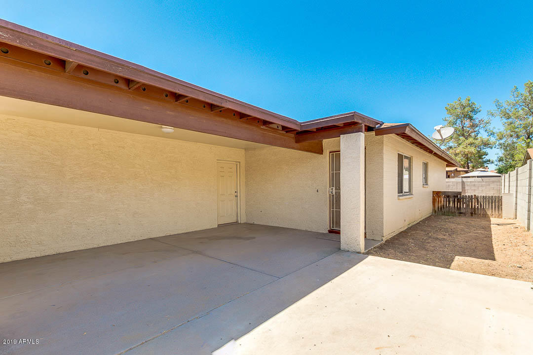 1860 East Inverness Avenue Mesa, AZ 85204 - Photo 5 of 29 a view of a house with a backyard