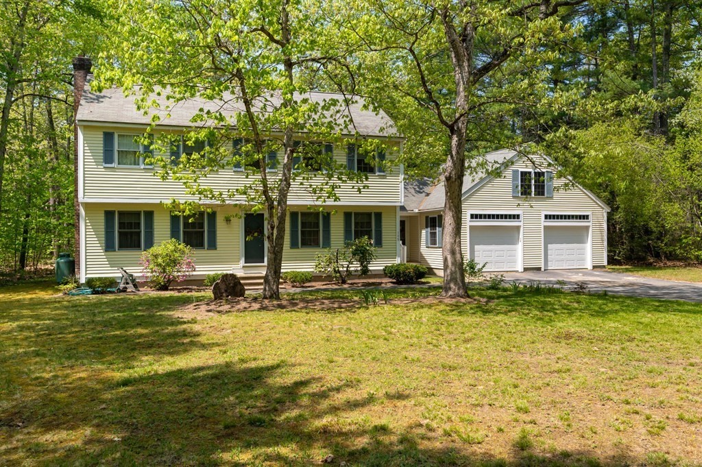 105 Warren Road Townsend, MA 01469 - Photo 1 of 37 a front view of a house with swimming pool