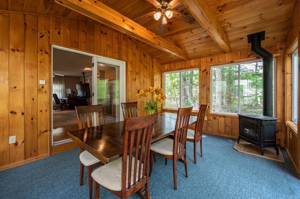 105 Warren Road Townsend, MA 01469 - Photo 11 of 37 a view of a dining room with furniture window and outside view