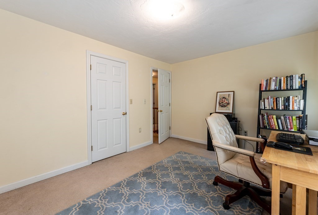 105 Warren Road Townsend, MA 01469 - Photo 16 of 37 a view of a workspace with furniture