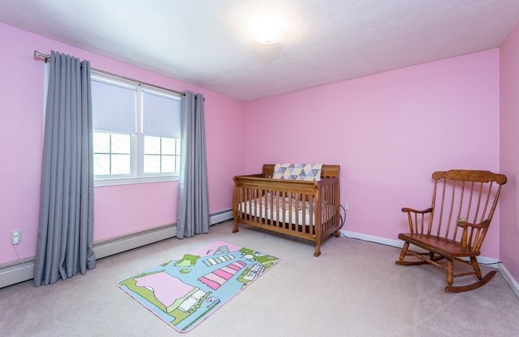 105 Warren Road Townsend, MA 01469 - Photo 22 of 37 a bedroom with furniture and a window