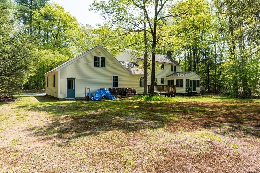 105 Warren Road Townsend, MA 01469 - Photo 28 of 37 a view of a house with a yard