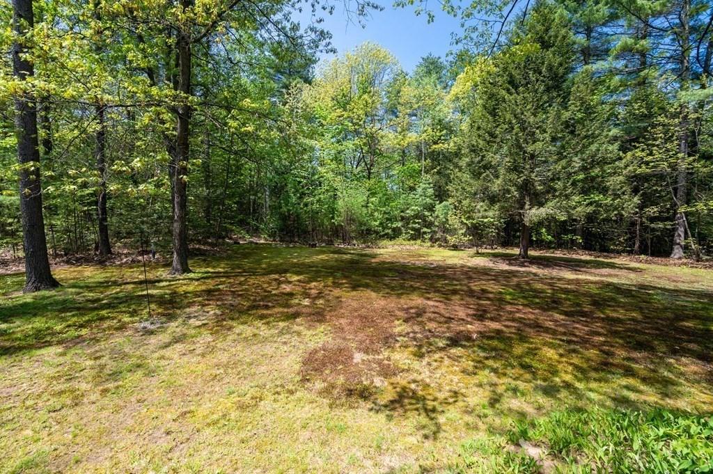 105 Warren Road Townsend, MA 01469 - Photo 31 of 37 a view of outdoor space with trees
