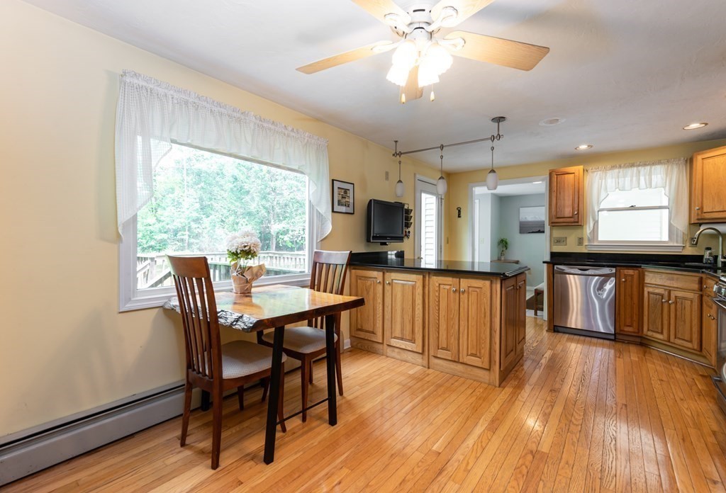 105 Warren Road Townsend, MA 01469 - Photo 4 of 37 a view of a dining room with furniture window and wooden floor