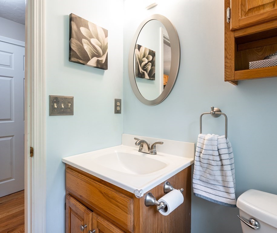 105 Warren Road Townsend, MA 01469 - Photo 8 of 37 a bathroom with a sink and a mirror