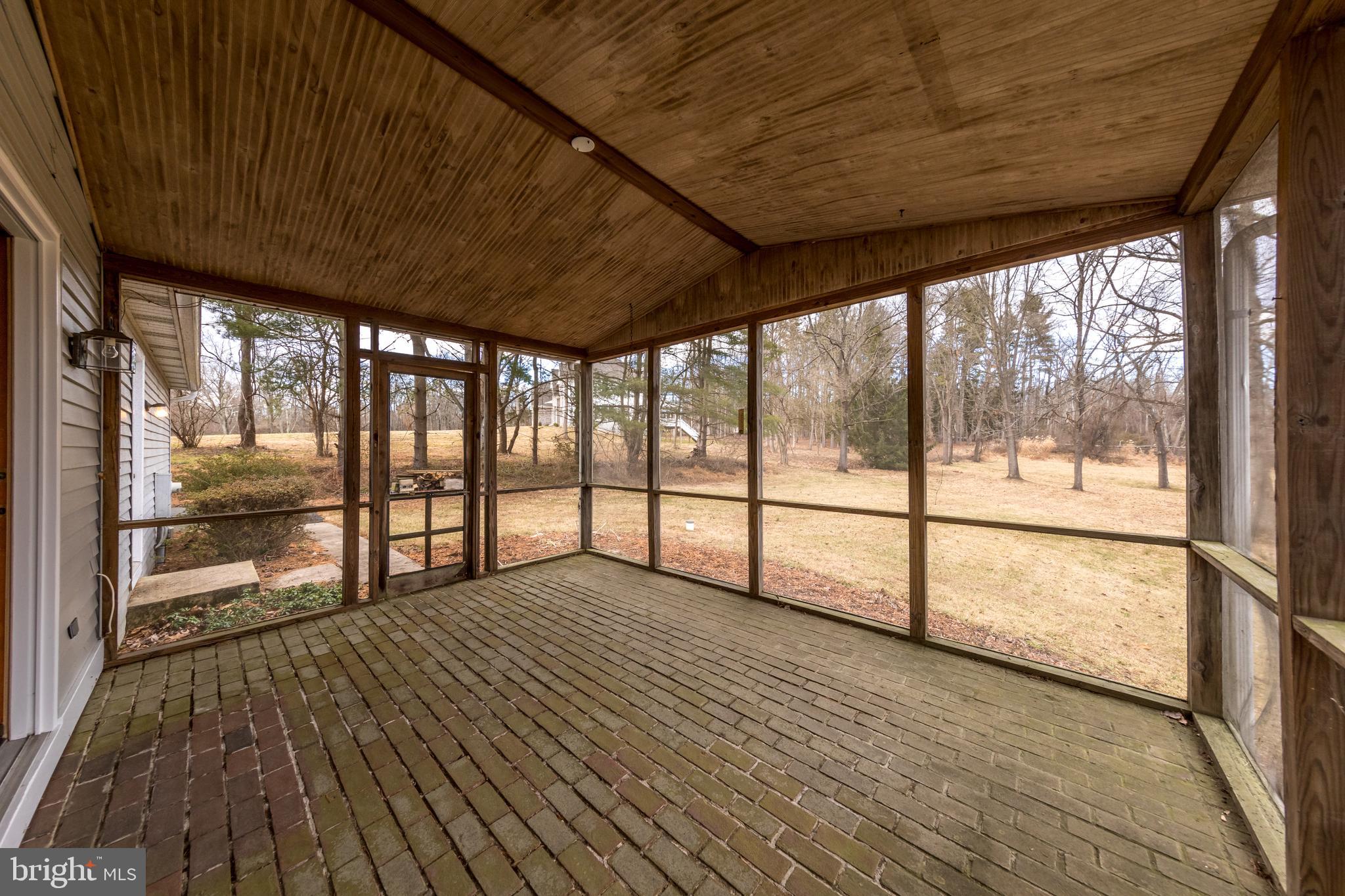 3044 Level Road Churchville, MD 21028 - Photo 21 of 52 a view of an empty room with wooden floor and a window