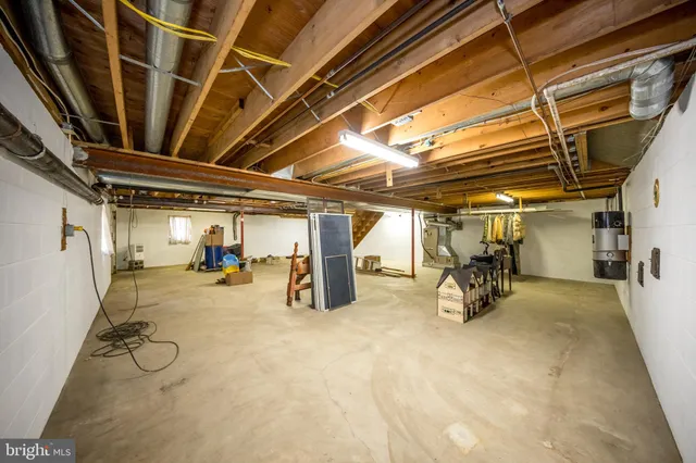 a view of a garage with white wall
