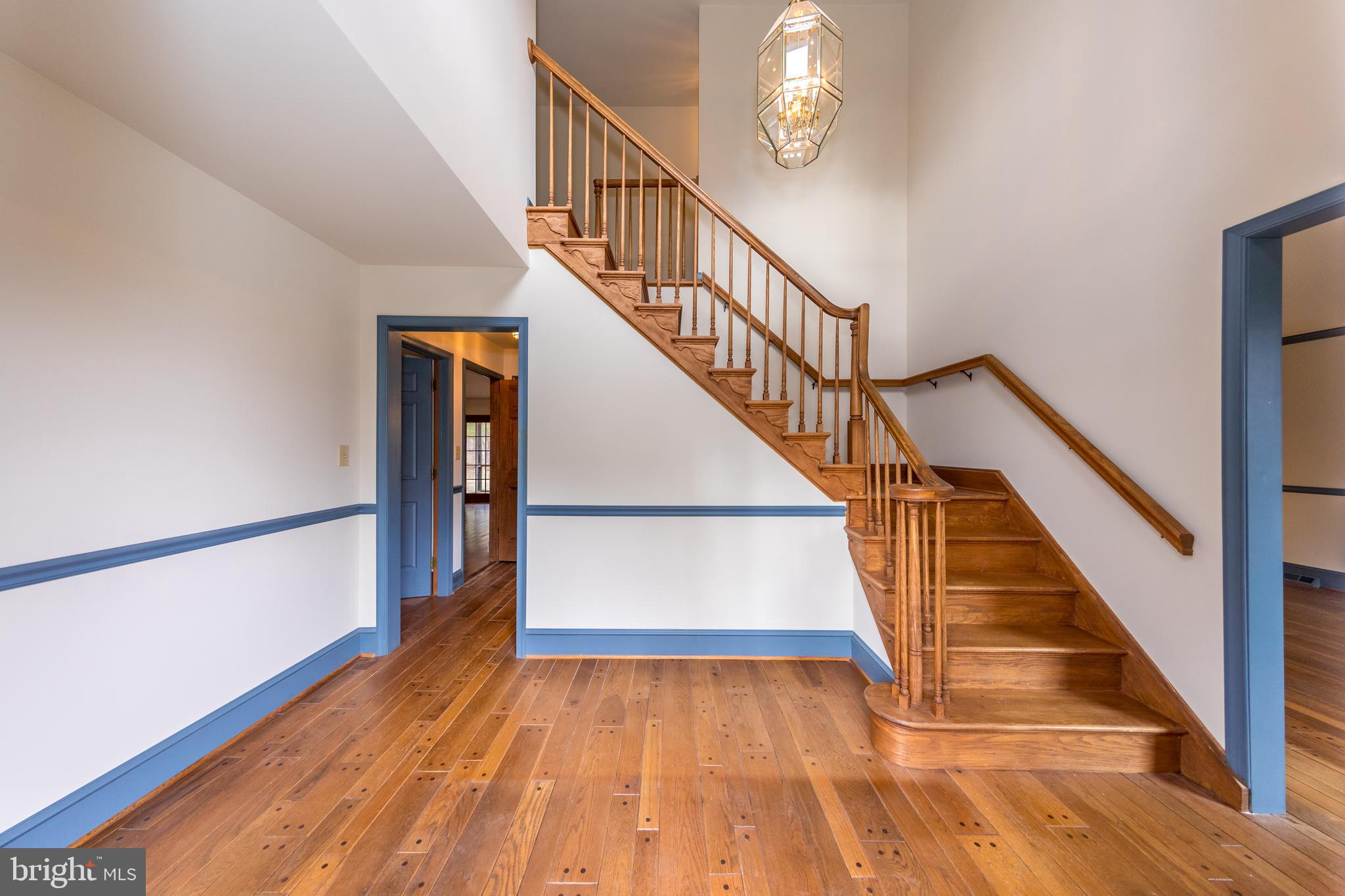 3044 Level Road Churchville, MD 21028 - Photo 7 of 52 a view of staircase with wooden floor and white walls