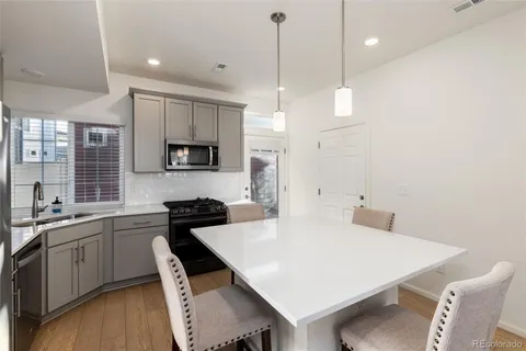 a bedroom with a bed and a flat tv screen