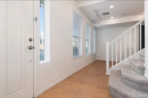 a living room with furniture and window