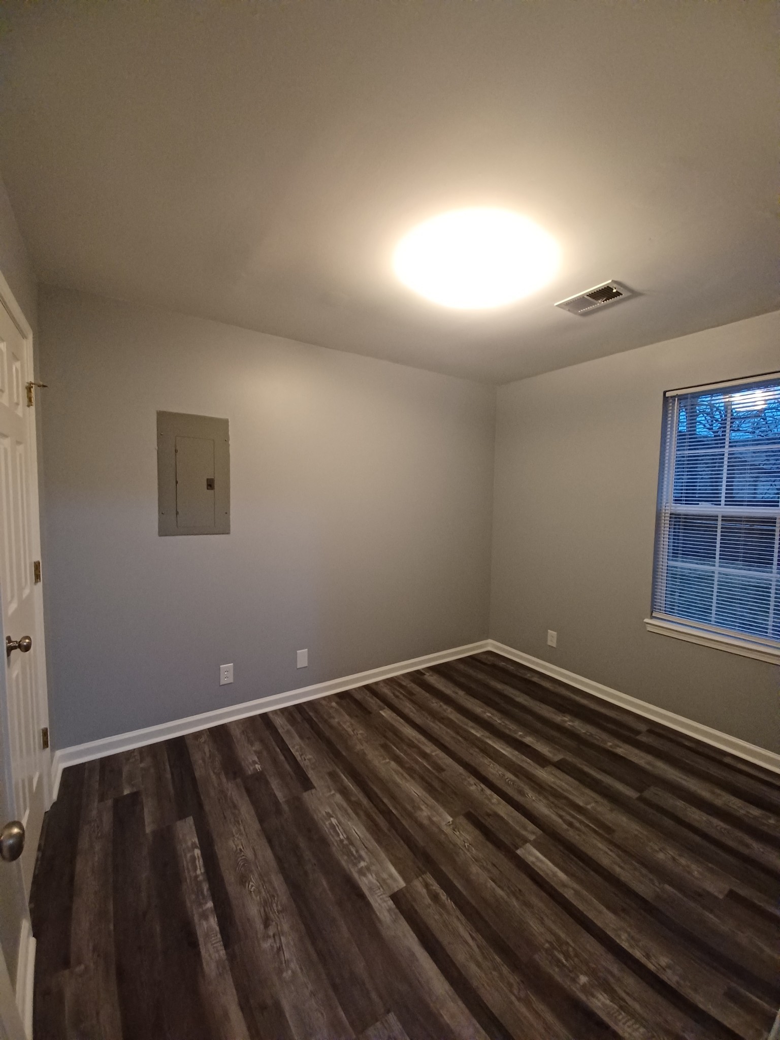 1039 Shadow Ridge Avenue Oak Grove, KY 42262 - Photo 11 of 16 a view of an empty room and wooden floor