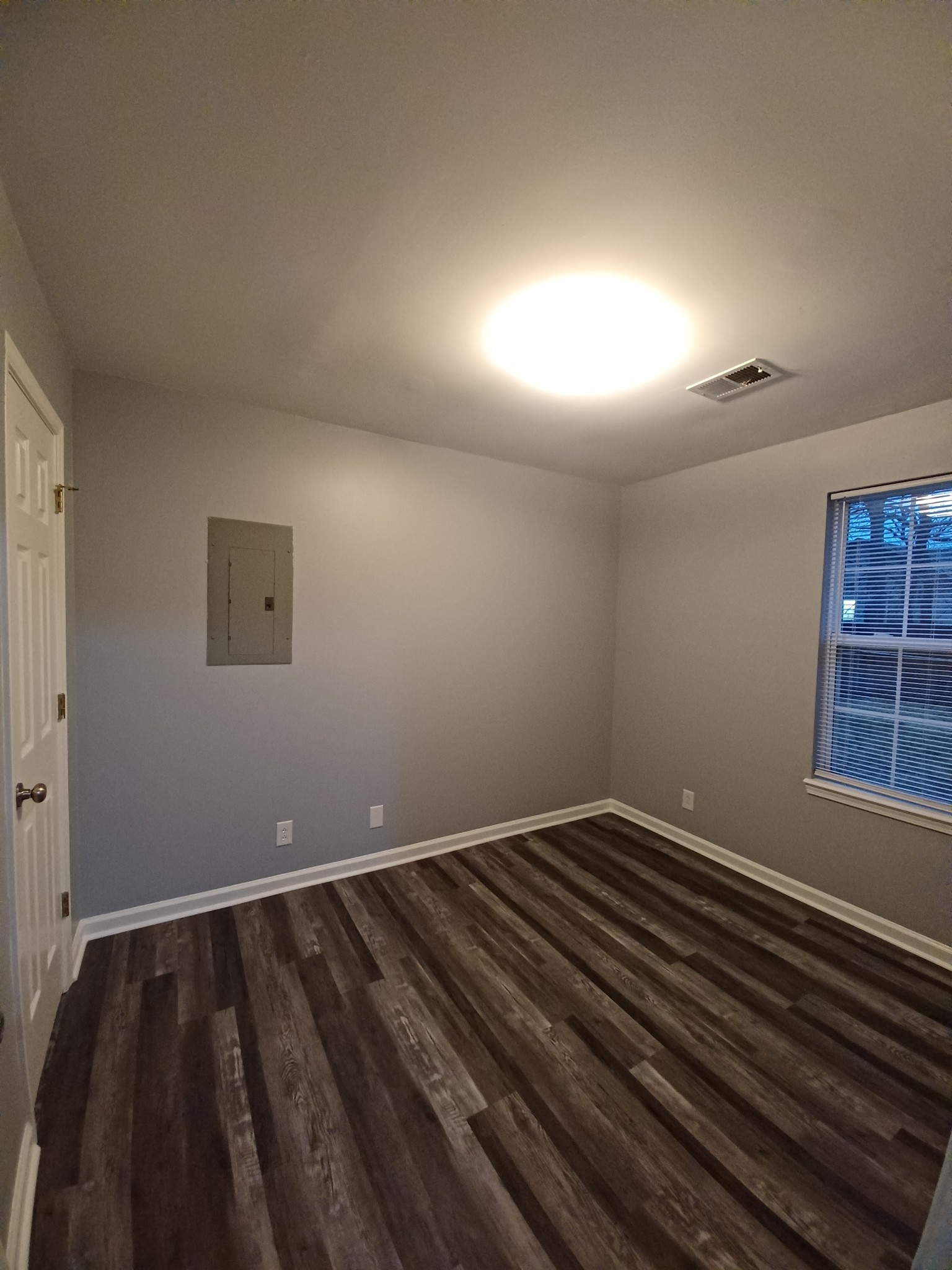 1039 Shadow Ridge Avenue Oak Grove, KY 42262 - Photo 13 of 16 a view of wooden floor and windows in a room