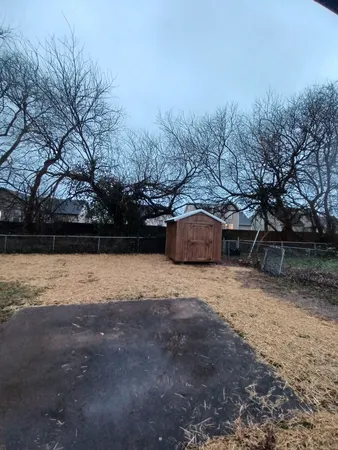 a street view with wooden fence