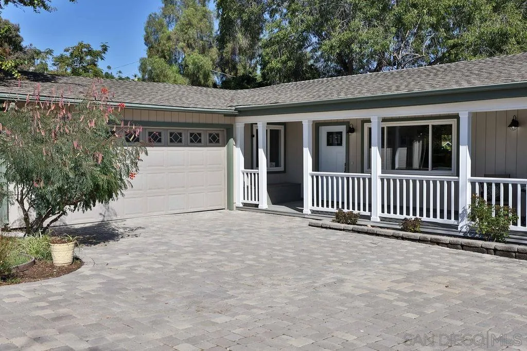 9802 Sierra Madre Road Spring Valley, CA 91977 - Photo 2 of 48 front view of a house with a yard