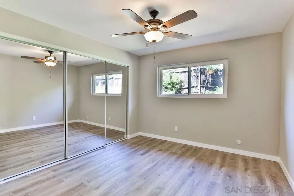 9802 Sierra Madre Road Spring Valley, CA 91977 - Photo 24 of 48 wooden floor in an empty room with a window