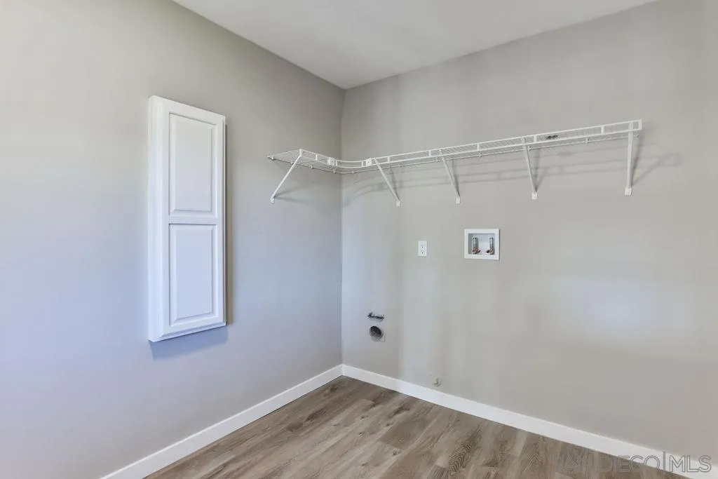 9802 Sierra Madre Road Spring Valley, CA 91977 - Photo 27 of 48 a view of a room with wooden floor