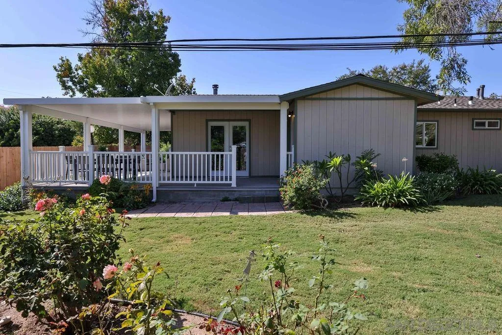 9802 Sierra Madre Road Spring Valley, CA 91977 - Photo 29 of 48 front view of a house with a yard