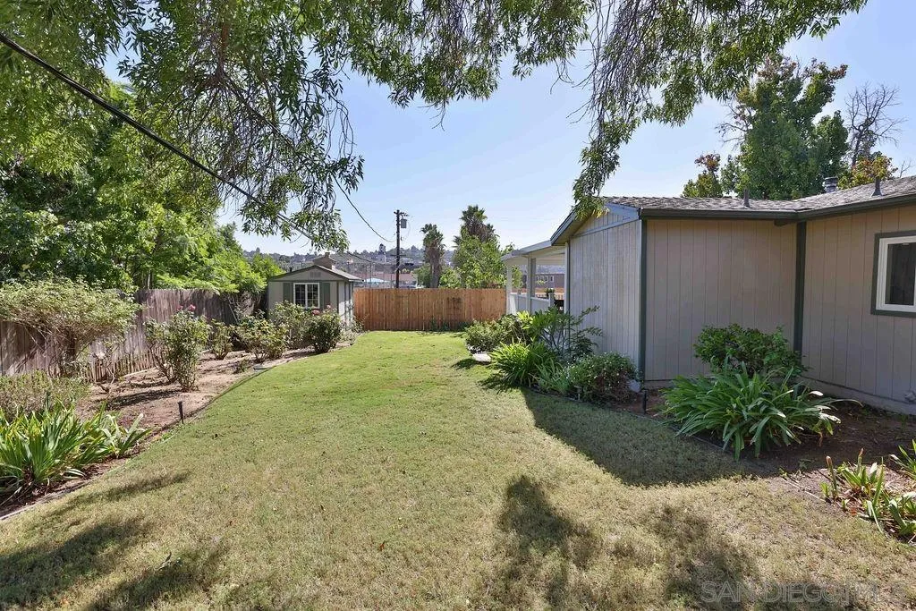 9802 Sierra Madre Road Spring Valley, CA 91977 - Photo 32 of 48 a view of a yard with yellow house