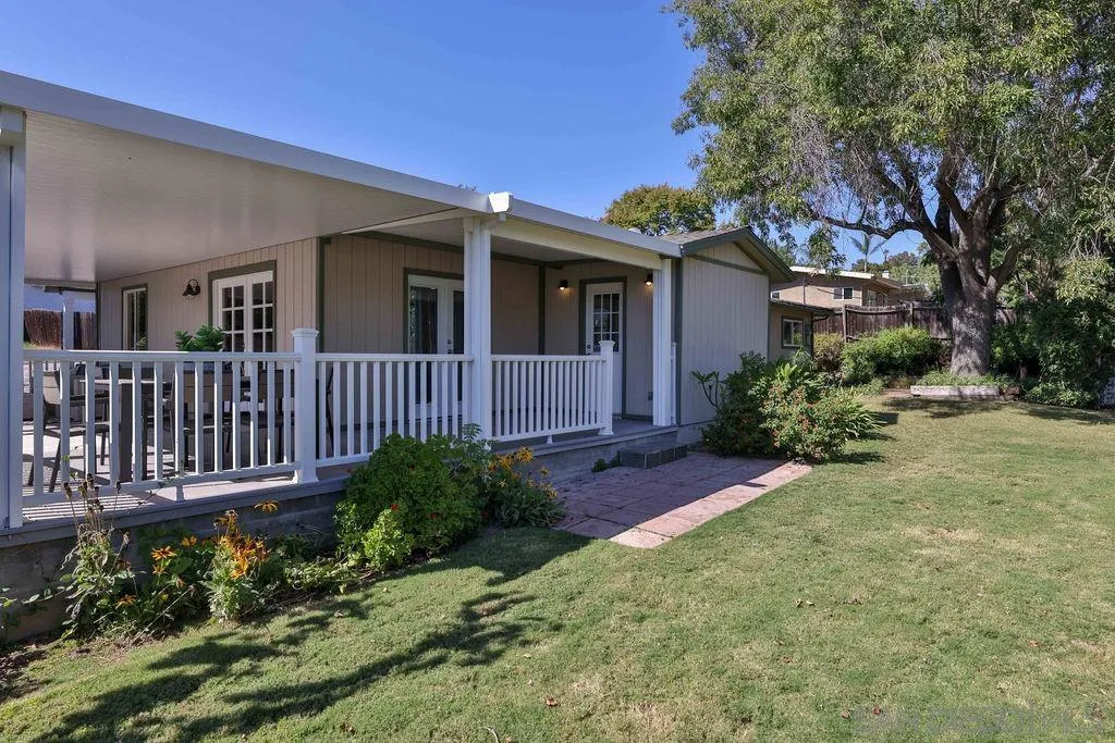 9802 Sierra Madre Road Spring Valley, CA 91977 - Photo 36 of 48 a front view of a house with garden