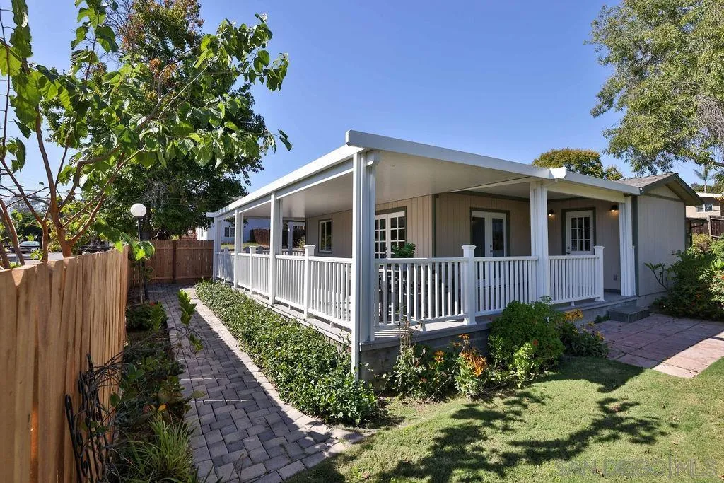 9802 Sierra Madre Road Spring Valley, CA 91977 - Photo 37 of 48 a front view of a house with garden
