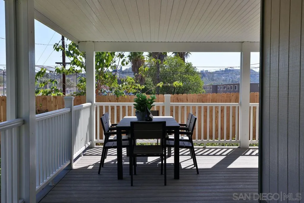 9802 Sierra Madre Road Spring Valley, CA 91977 - Photo 38 of 48 a view of a balcony dining table and chairs