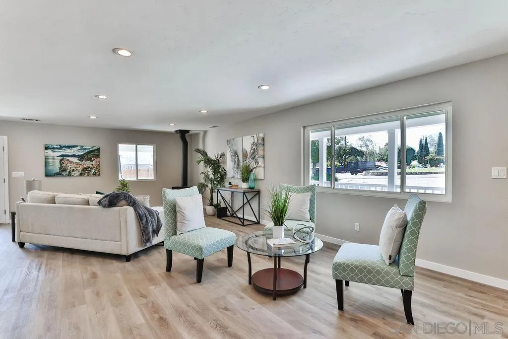 9802 Sierra Madre Road Spring Valley, CA 91977 - Photo 4 of 48 a living room with furniture and a large window