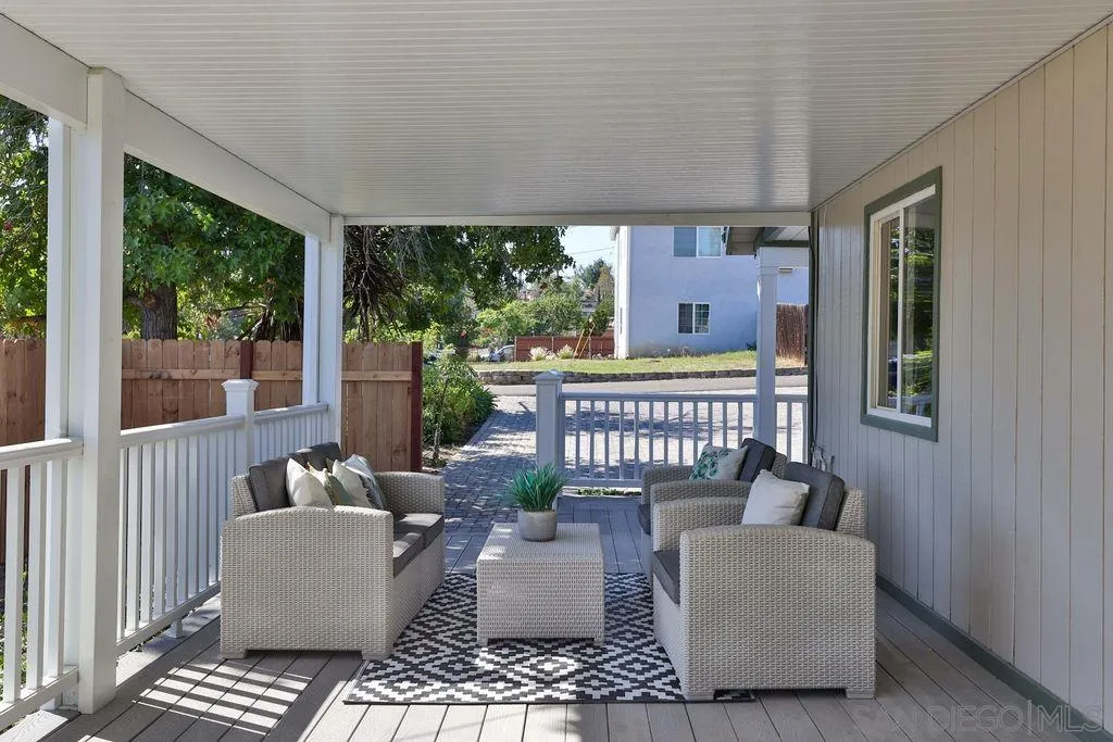 9802 Sierra Madre Road Spring Valley, CA 91977 - Photo 41 of 48 a balcony with furniture and a potted plant