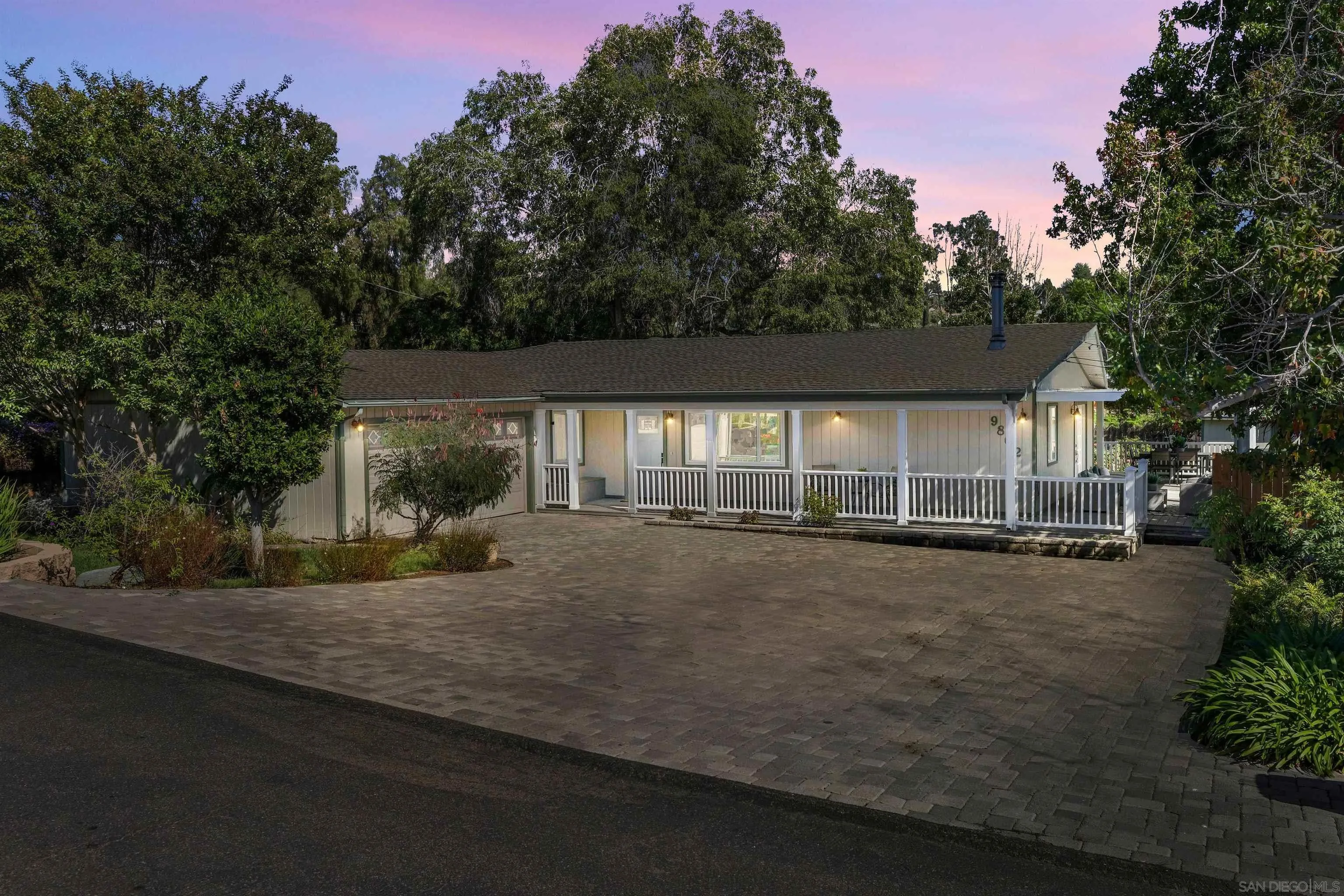 9802 Sierra Madre Road Spring Valley, CA 91977 - Photo 43 of 48 a view of a house with backyard and garden
