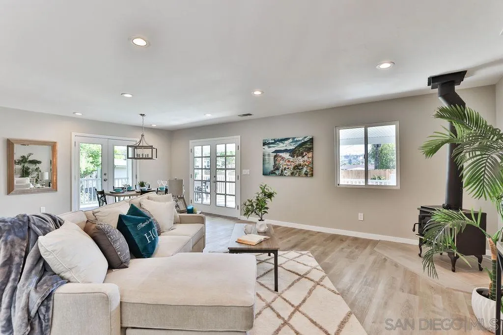 9802 Sierra Madre Road Spring Valley, CA 91977 - Photo 5 of 48 a living room with furniture and a potted plant