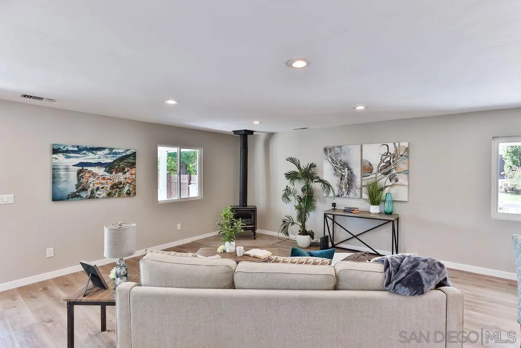 9802 Sierra Madre Road Spring Valley, CA 91977 - Photo 6 of 48 a living room with furniture and a potted plant