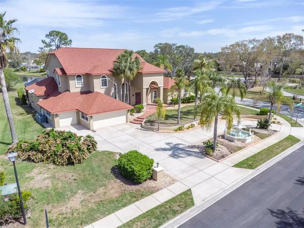 $899,900 | 4404 Lake In The Woods Drive, Spring Hill, FL 34607