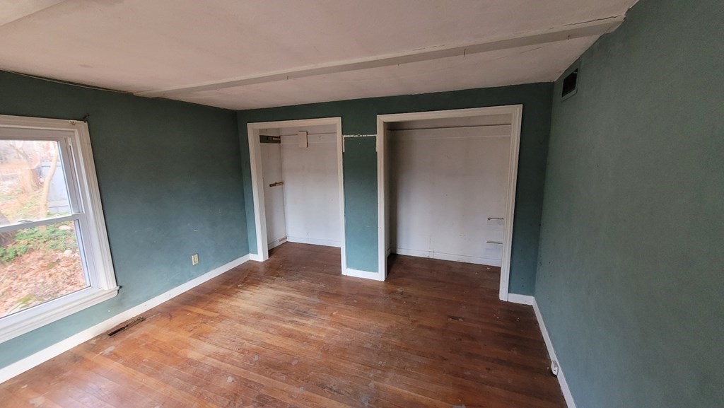 136 Main Road Westfield, MA 01085 - Photo 6 of 13 an empty room with windows