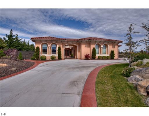12805 Silver Wolf Road Reno, NV 89511 - Photo 1 of 9 a front view of a house with a yard