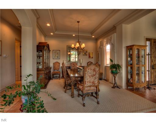 12805 Silver Wolf Road Reno, NV 89511 - Photo 5 of 9 a view of a dining room with furniture and chandelier
