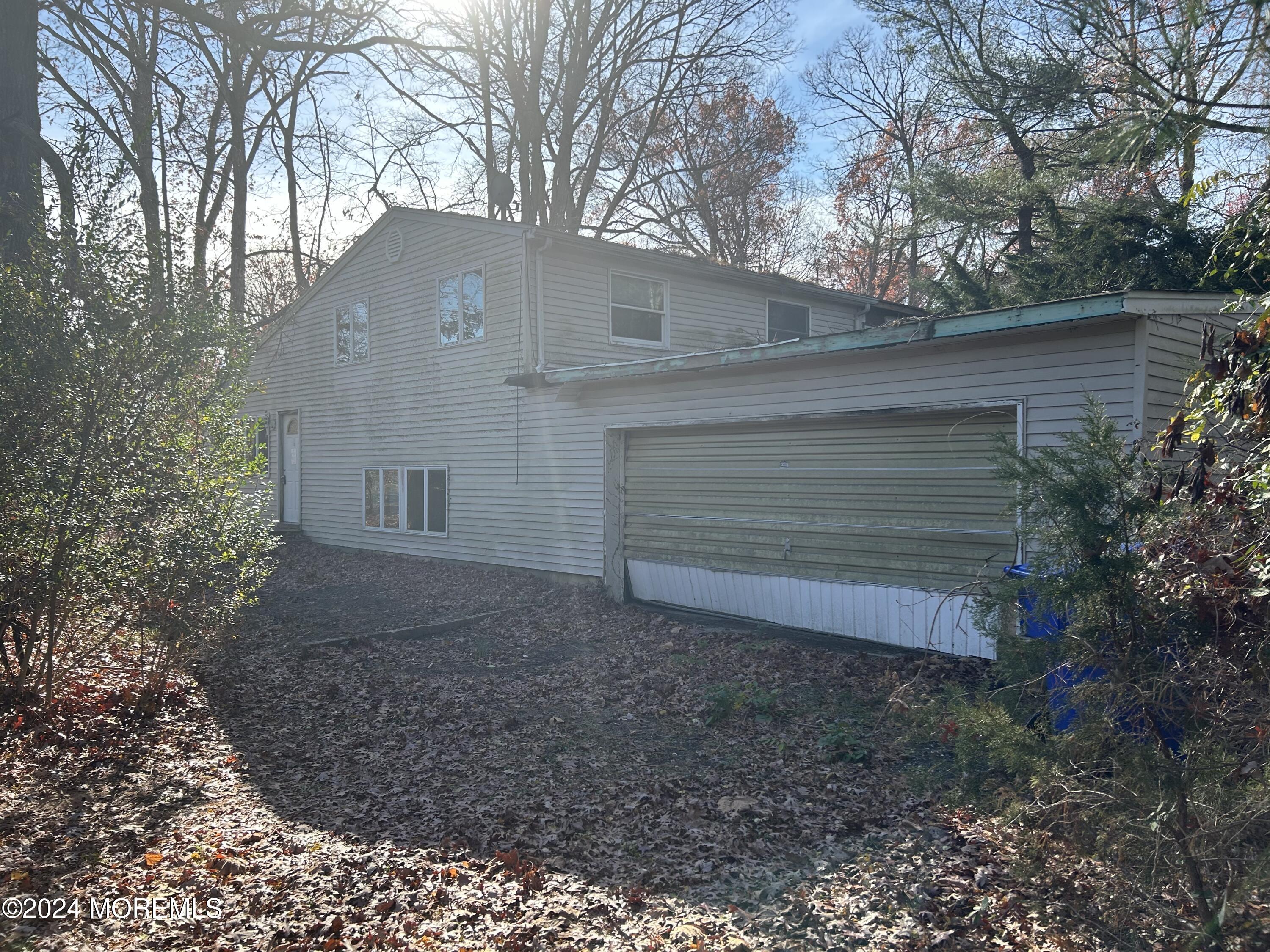 a view of backyard of house