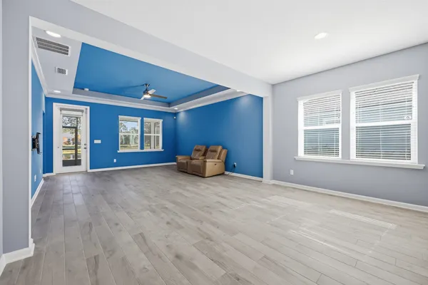 a view of an empty room with a window