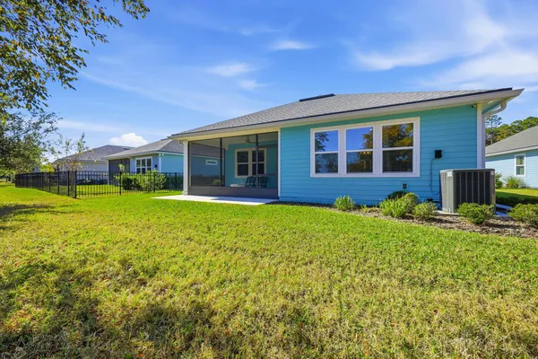 a view of yard with swimming pool and outdoor seating