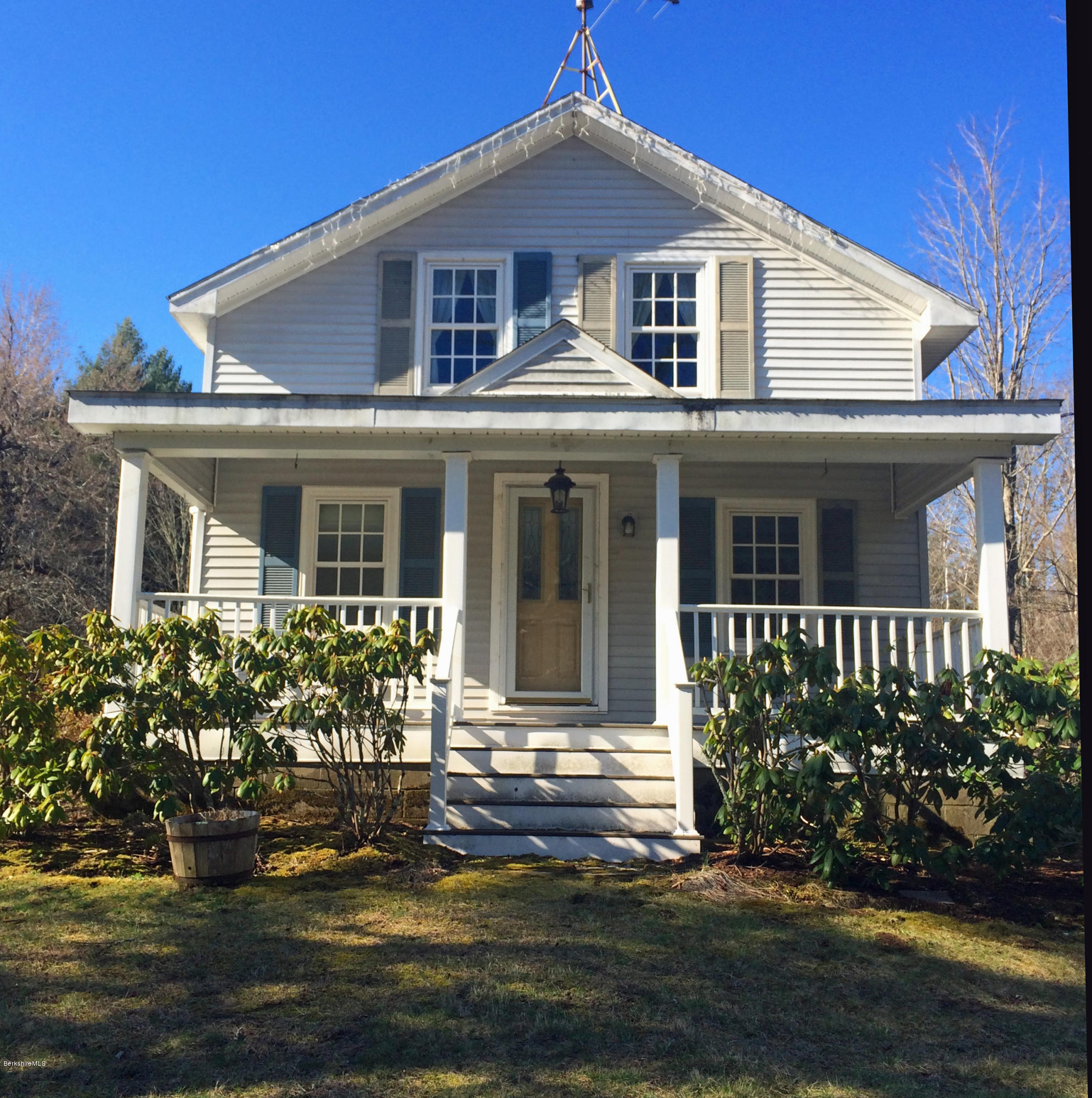 55 Sandisfield Road Sandisfield, MA 01255 - Photo 2 of 20 front view of a house with a yard
