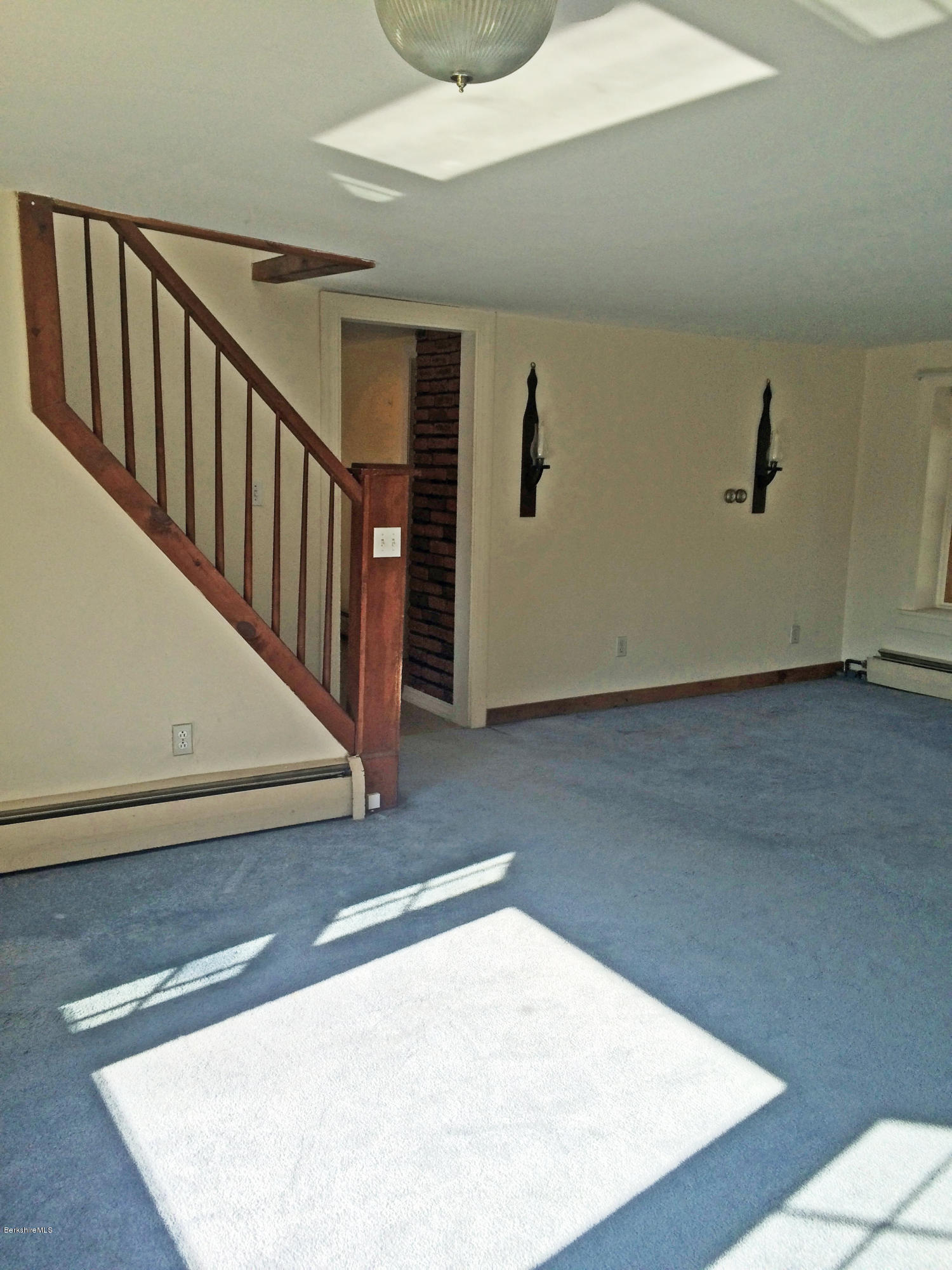 55 Sandisfield Road Sandisfield, MA 01255 - Photo 12 of 20 a view of a hallway with staircase