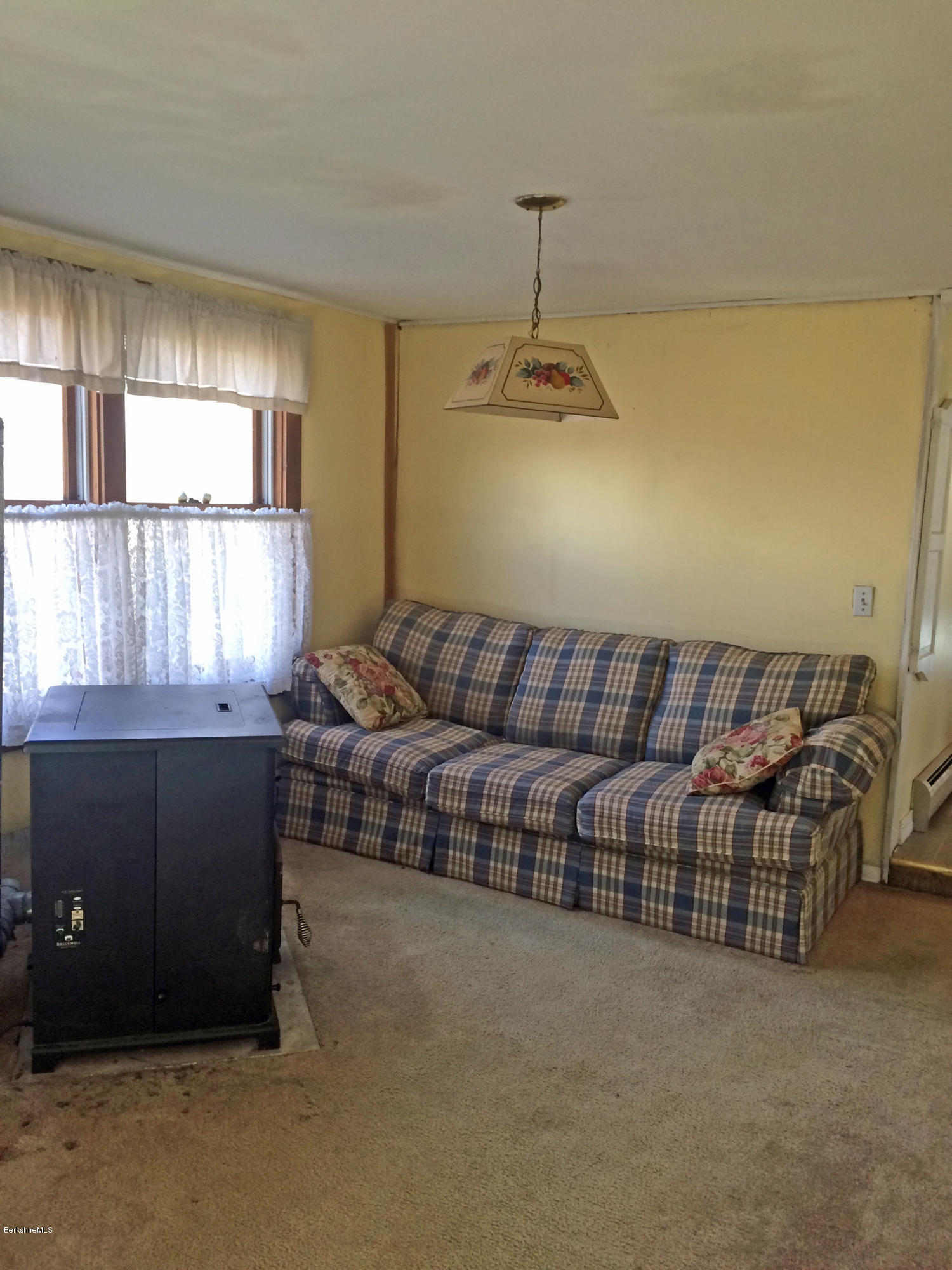 55 Sandisfield Road Sandisfield, MA 01255 - Photo 13 of 20 a living room with furniture