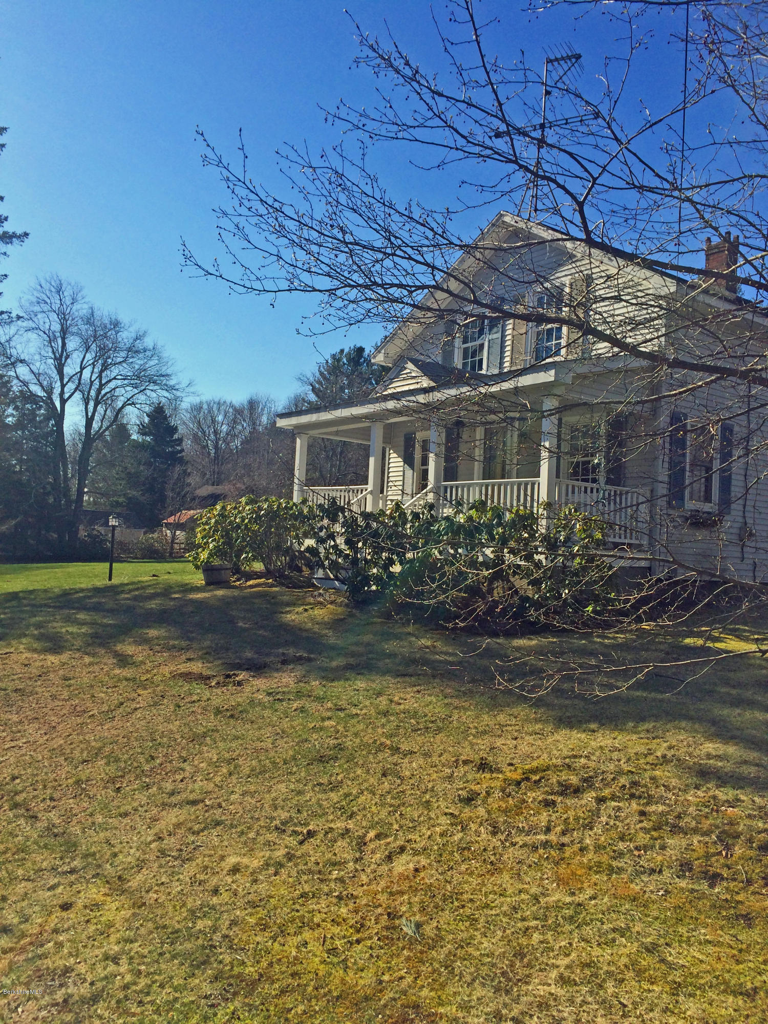 55 Sandisfield Road Sandisfield, MA 01255 - Photo 20 of 20 a front view of a house with a yard