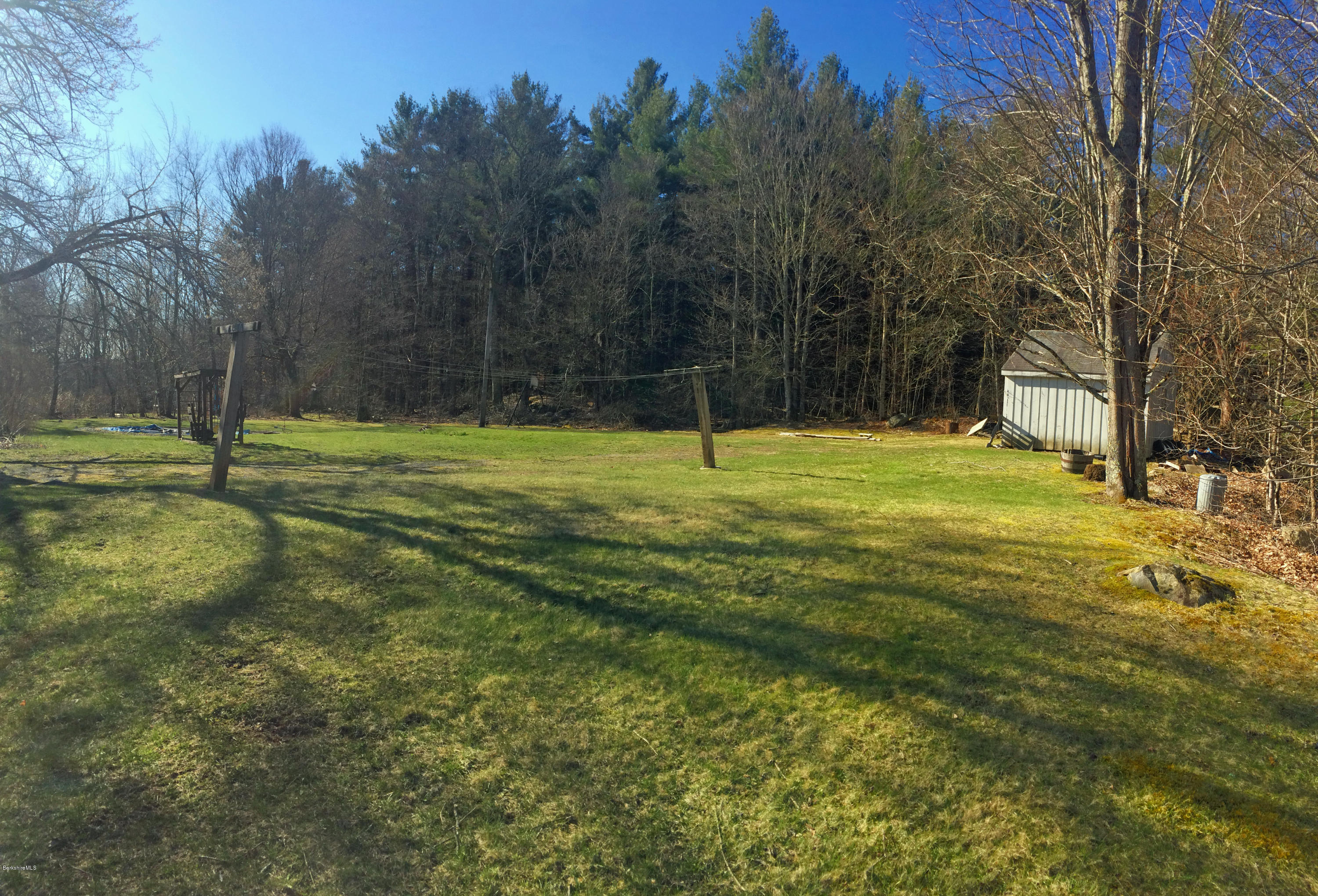 55 Sandisfield Road Sandisfield, MA 01255 - Photo 5 of 20 a view of a field with a tree
