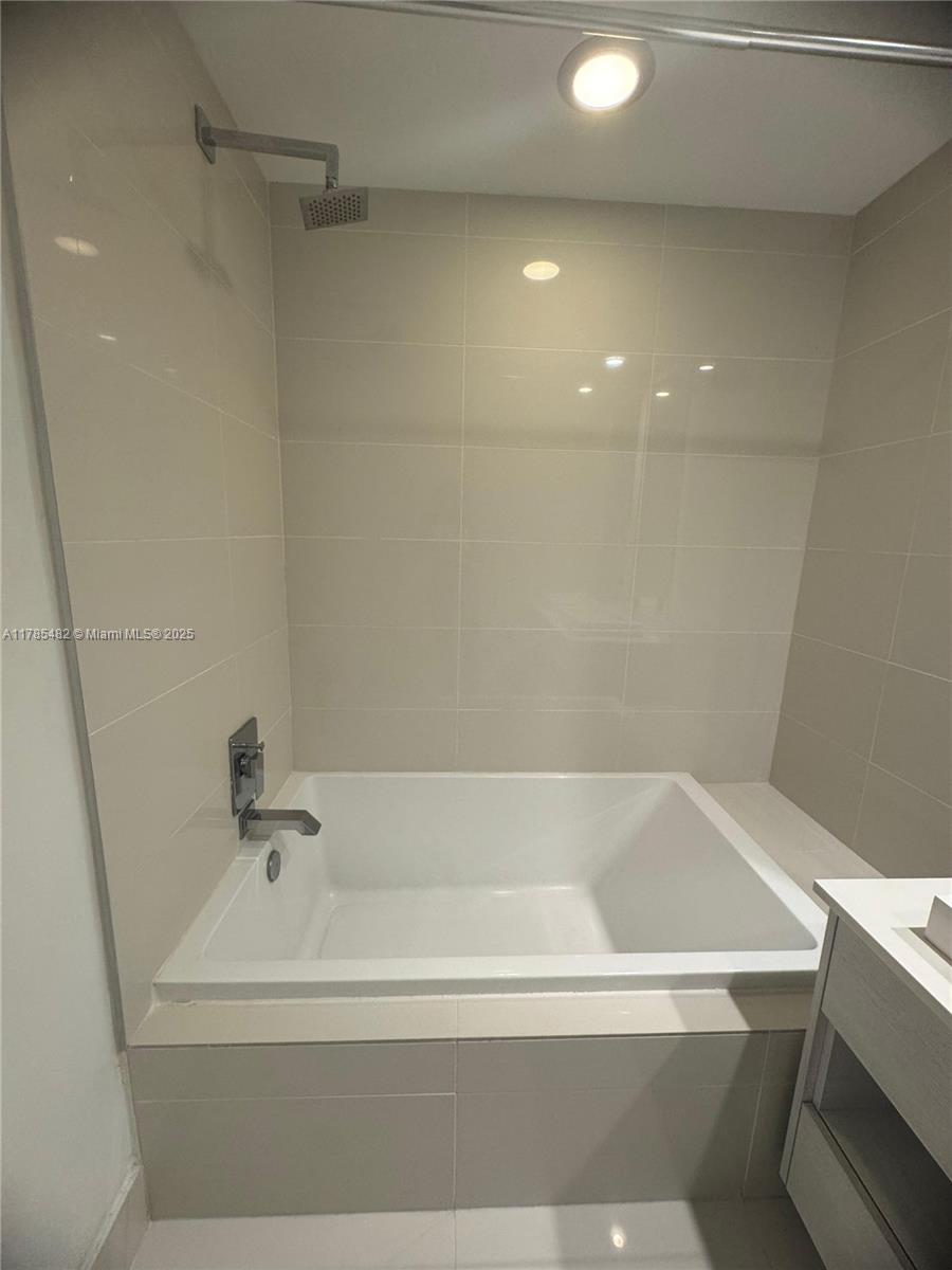 Brickell Miami, FL 33130 - Photo 11 of 12 a bathroom with a bathtub