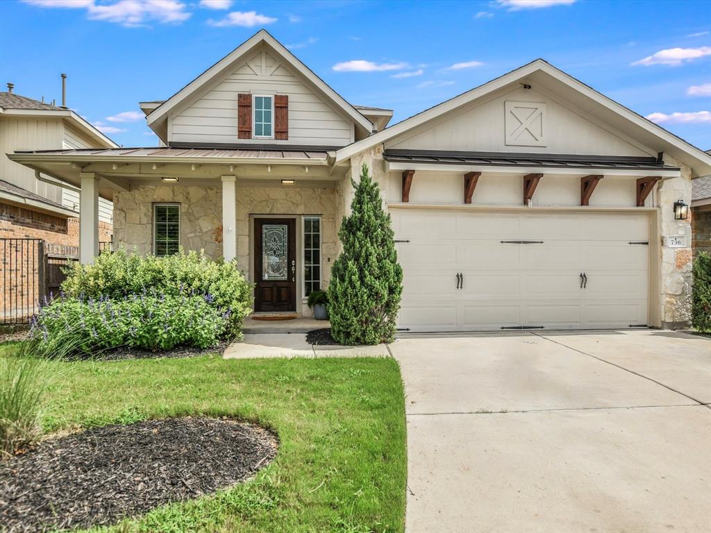 736 Bonnet Boulevard Georgetown, TX 78628 - Photo 1 of 27 a front view of a house with a yard and garage