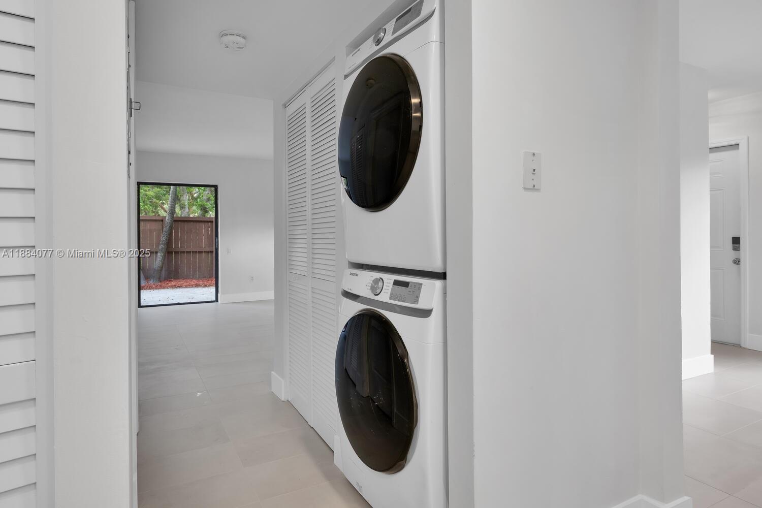 11500 Southwest 64th Street, Unit H Miami, FL 33173 - Photo 14 of 38 a close view of a utility room with washer and dryer