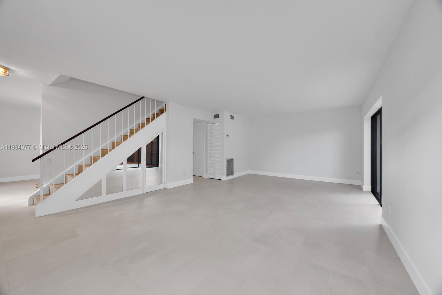 11500 Southwest 64th Street, Unit H Miami, FL 33173 - Photo 15 of 38 a view of an empty room