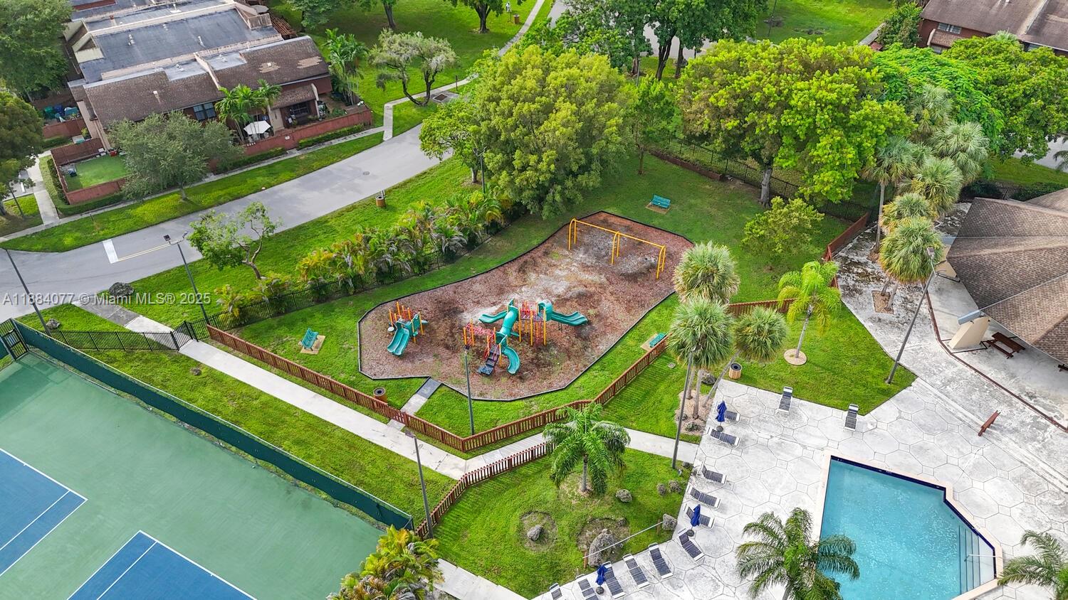 11500 Southwest 64th Street, Unit H Miami, FL 33173 - Photo 35 of 38 an aerial view of a backyard