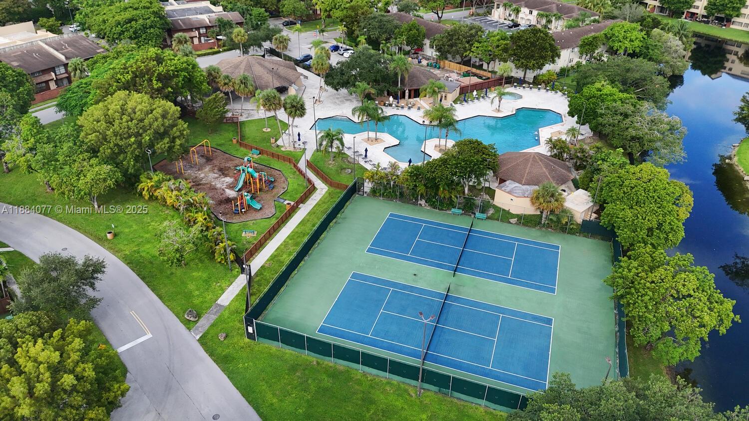 11500 Southwest 64th Street, Unit H Miami, FL 33173 - Photo 36 of 38 an aerial view of a house